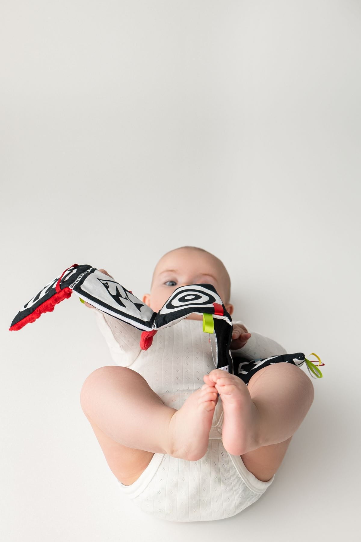 Mom's Care - Mom's Care - Zachte Babyboek - Rood - Playlaan