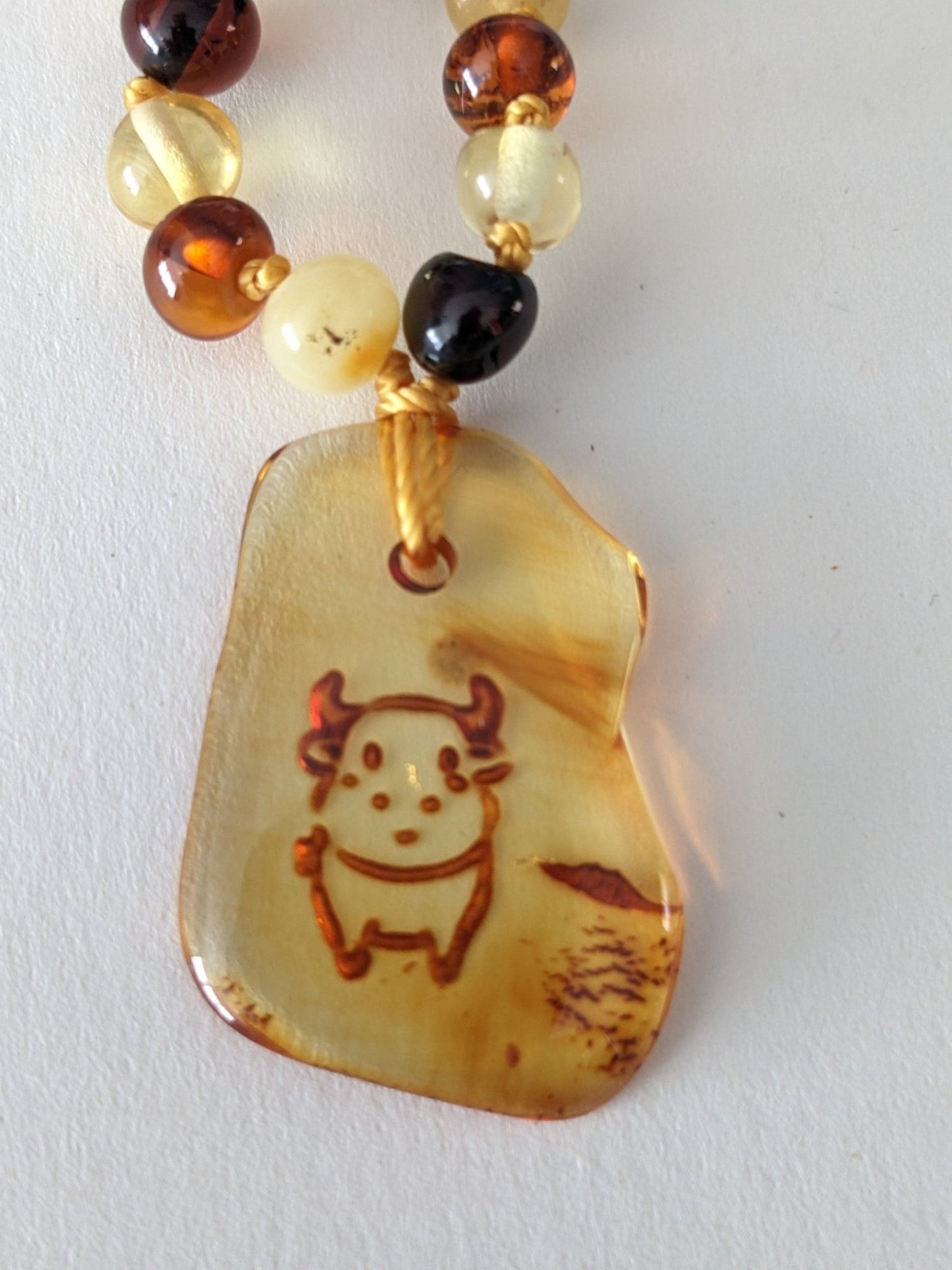 Amber Heart - Barnsteen sterrenbeeld ketting met hanger 33 cm - Playlaan
