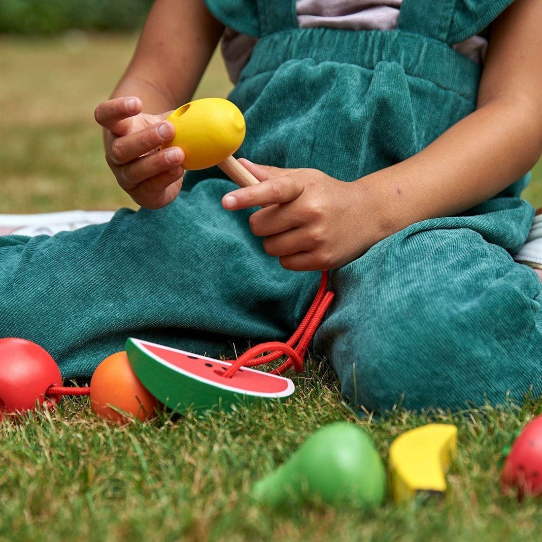 Tickit - Tickit - Rijgspel met houten fruit - Playlaan