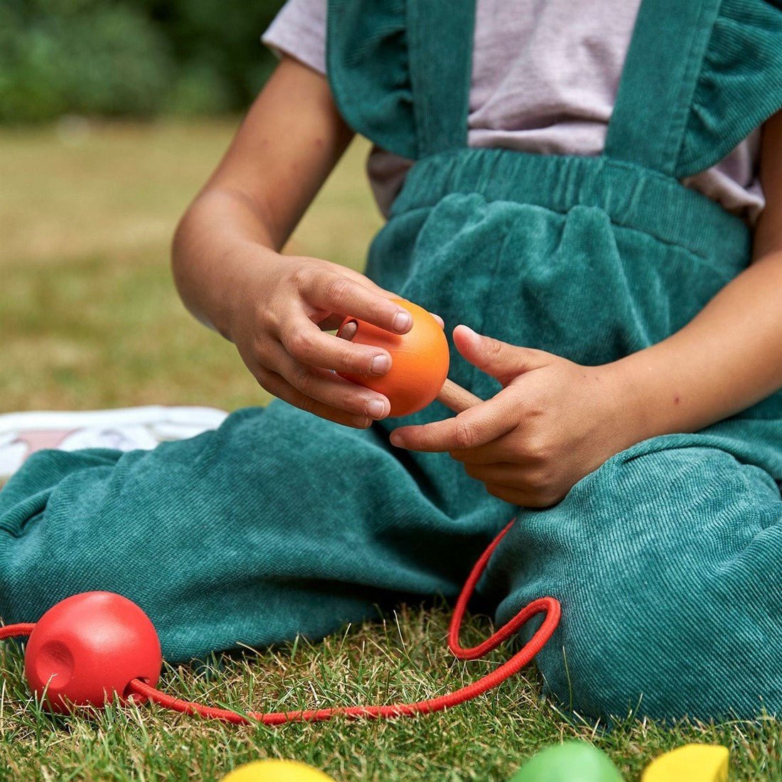Tickit - Tickit - Rijgspel met houten fruit - Playlaan