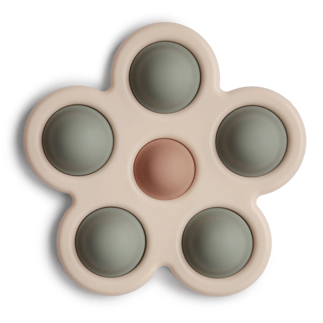 Mushie - Sensorische Bloem Press Toy - Playlaan